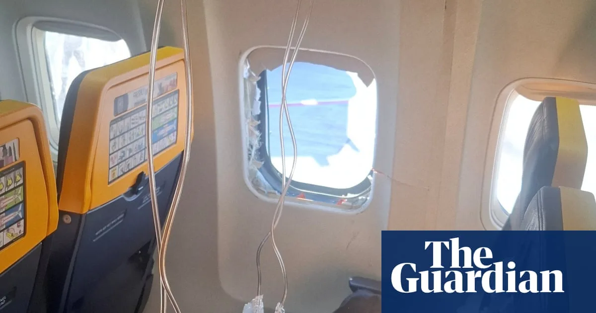 Wife of Ryanair passenger describes holding him as he hung out of window