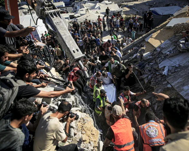 At least 12 killed after building in Gaza City damaged by Israeli strike…
