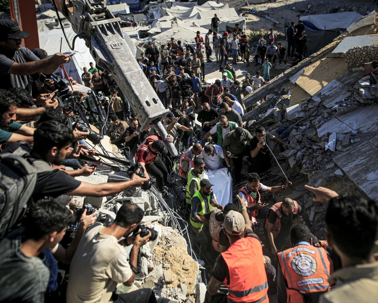 At least 12 killed after building in Gaza City damaged by Israeli strike…