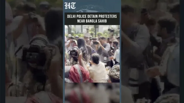 Delhi police detain Neha Bora and protest leaders during CJP demonstration
